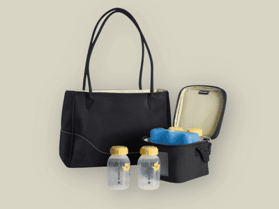 Momm black tote bag with insulated cooler, two baby bottles, and blue ice packs for milk storage.