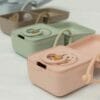 BIBS Pacifier Box in baby blue, baby pink, blossom, and blush, showcasing a stylish and functional design for pacifier