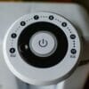 Tommee Tippee Perfect Prep Machine control dial with power button and measurement indicators for precise formula preparation.