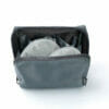 Haakaa 2x Ladybug Breast Milk Collector set in a grey storage bag, featuring two 150ml collectors neatly organized inside.
