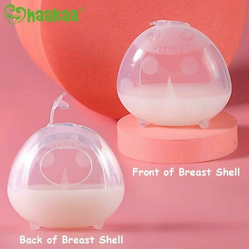 Haakaa 2x Ladybug Breast Milk Collector in transparent design, showing front and back views, ideal for discreet milk storage.
