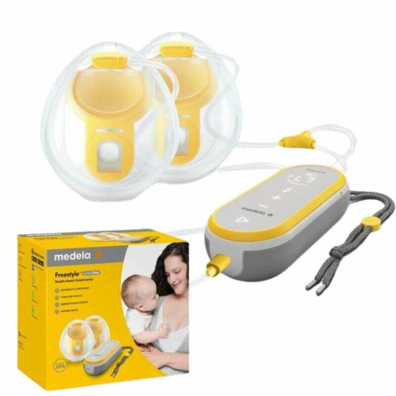 Medela Freestyle hands-free double electric breast pump in yellow and gray with two breast shields and control unit.