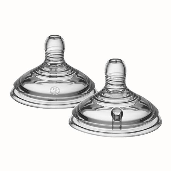 Tommee Tippee breast pump set includes two clear silicone teats, designed for easy feeding and comfort.