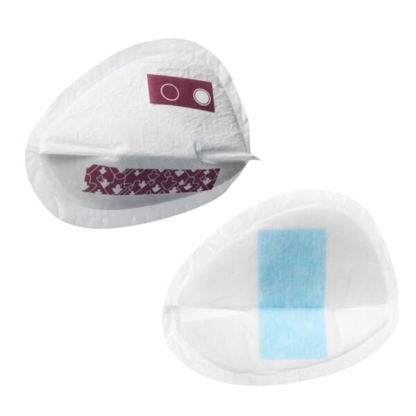 Tommee Tippee breast pump set includes disposable breast pads in white with colorful designs for leak protection.