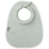 Tommee Tippee soft green bib with a rounded neck hole, perfect for keeping babies clean during mealtime.