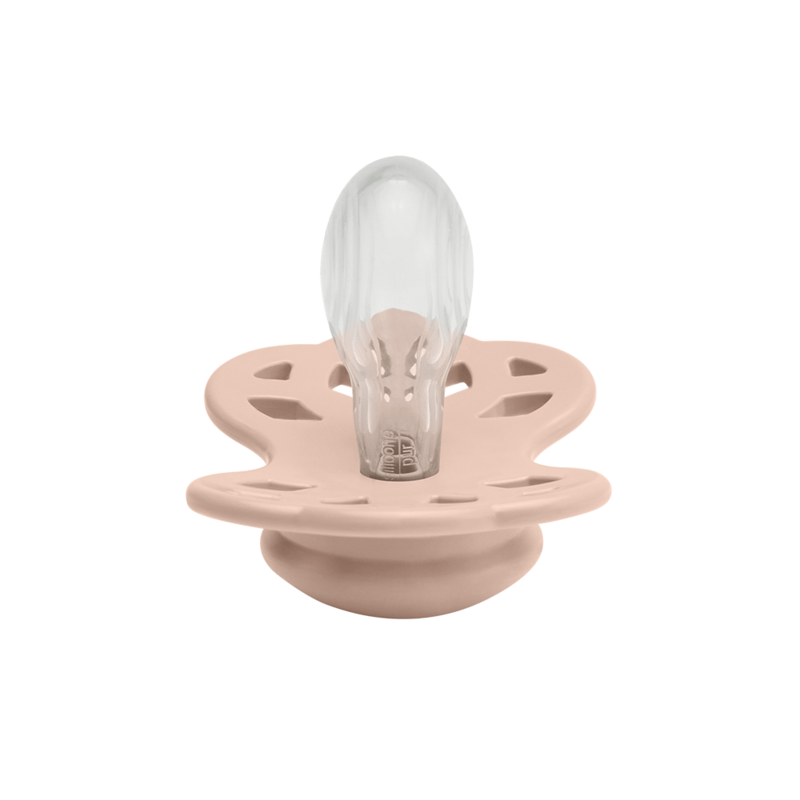 BIBS Infinity Pacifier in Blush with a symmetrical design and clear silicone nipple, ideal for infants.