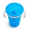 Munchkin Snack And Sip Cup in blue with a white lid and handles, featuring a straw for easy sipping.