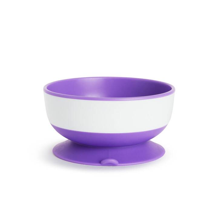 Munchkin Stay Put Suction Bowl in purple and white with a strong suction base for mess-free feeding.