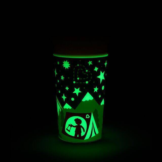 Munchkin Miracle 360° Glow In The Dark Cup in astronaut design, featuring camping-themed graphics and glowing stars.