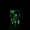 Munchkin Miracle 360° Glow In The Dark Cup in astronaut design, featuring colorful space-themed graphics.