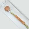 Kid Raine Affirmations Dummy Clip in neutral tones with wooden beads spelling "ENOUGH" and a wooden clip.