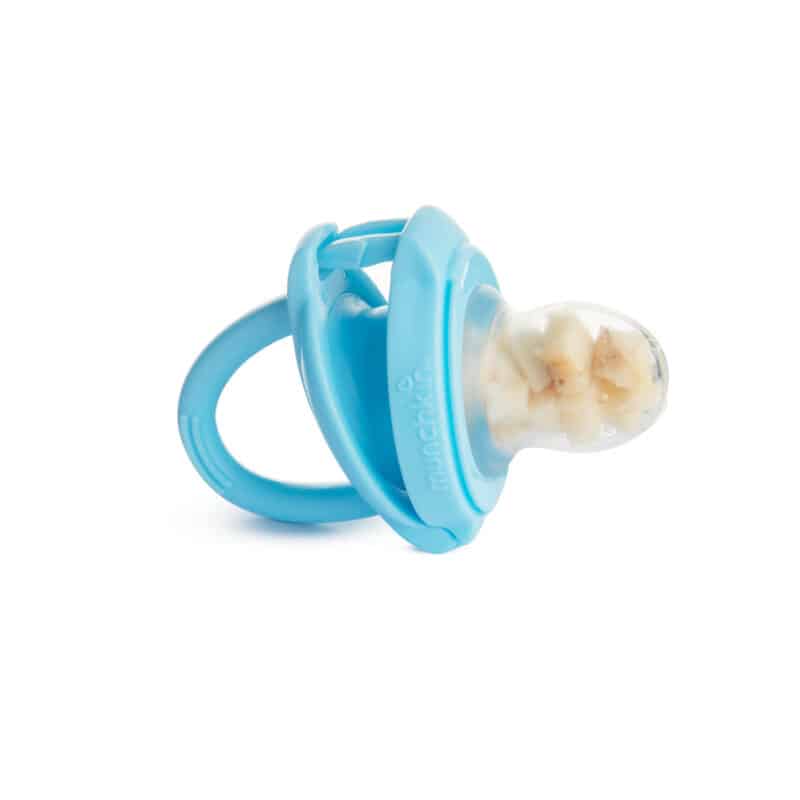 Munchkin Silicone Baby Food Feeder in blue with a soft silicone mesh for safe feeding of fruits and vegetables.