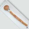 Kid Raine Affirmations Dummy Clip in neutral tones featuring wooden beads spelling "LOVED" and a wooden clip.