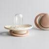 Tommee Tippee Newborn Soother 0-2m 2pk in grey, nude, and sage, featuring a soft silicone nipple and ergonomic design.