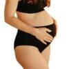 myboombra® high-rise underwear in black, designed for comfort during pregnancy, shown on a woman cradling her belly.