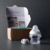Tommee Tippee Trial Pack featuring a 150ml bottle and 0-2m soother, displayed alongside its open packaging.