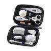 Tommee Tippee Healthcare Kit for Baby in a compact black case, featuring grooming tools like scissors, thermometer, and comb.