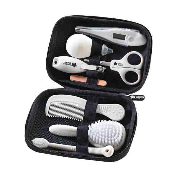 Tommee Tippee Healthcare Kit for Baby in a compact black case, featuring grooming tools like scissors, thermometer, and comb.