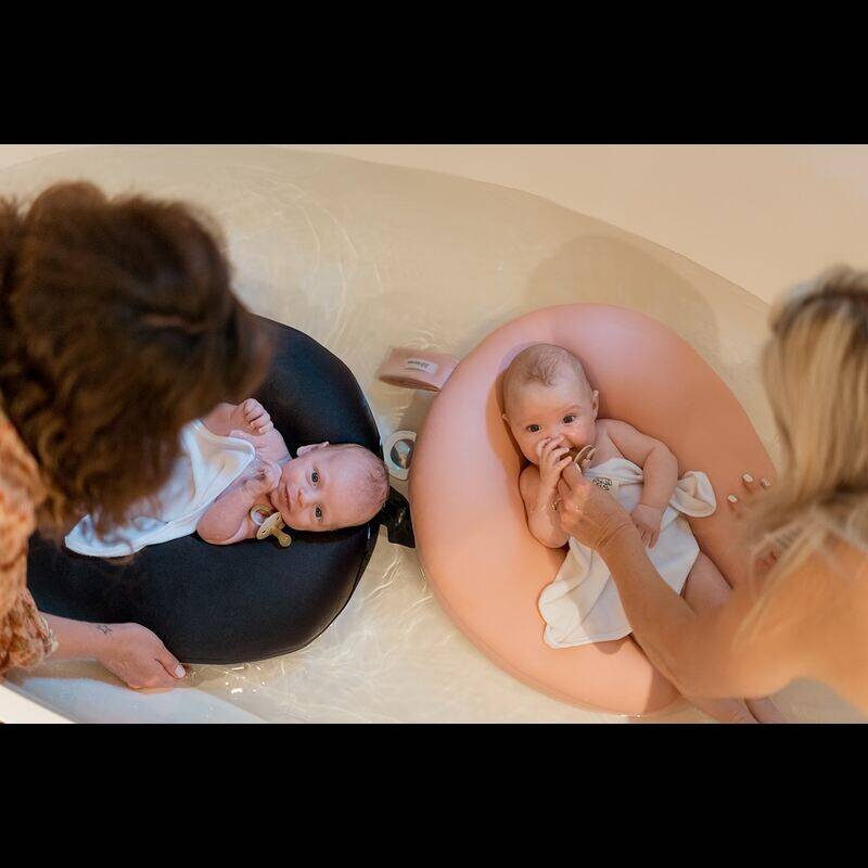 Little Bear Baby Bath Lilo in Duck Egg Blue and Natural, two babies comfortably bathed with adults in a serene setting.