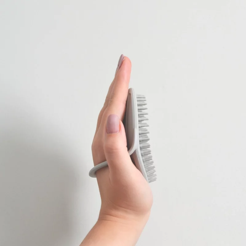 Hand Holding Brush – High Res