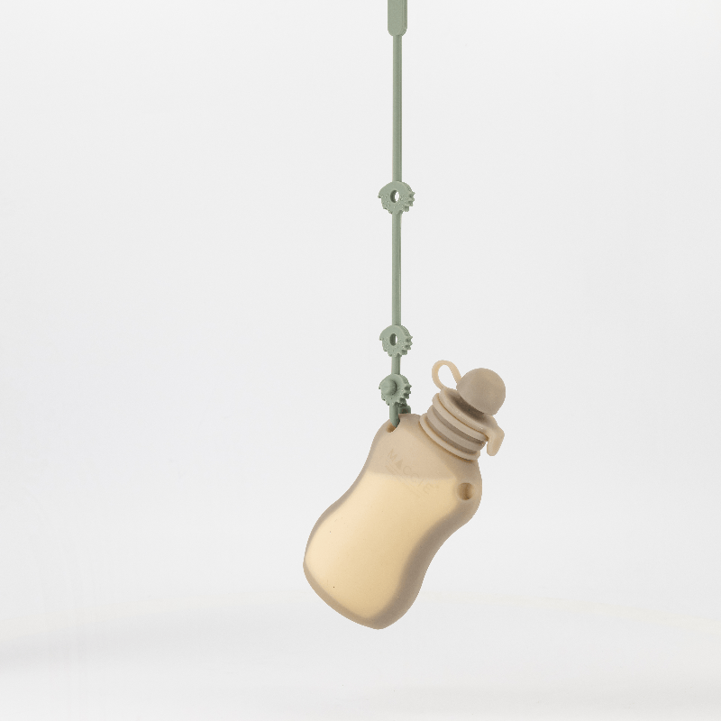Maccie Anti-Drop Chain in beige, featuring a unique bottle design, suspended from a green attachment.