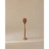 Mushie Silicone Baby Bottle Brush in Blush, featuring a textured head for effective cleaning, set against a neutral