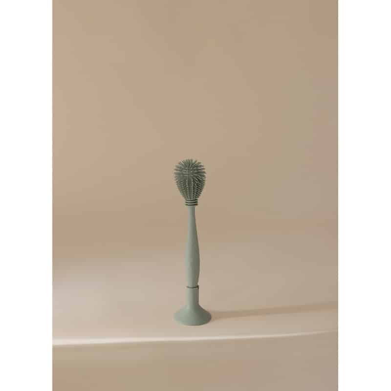 Mushie Silicone Baby Bottle Brush in Cambridge Blue with a soft, flexible bristle head for gentle cleaning.