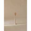 Mushie Silicone Baby Bottle Brush in Shifting Sand, featuring a soft silicone bristle head and a sleek handle.