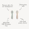 Mushie First Feeding Baby Spoons in blush and Cambridge blue, featuring sensory dots and dishwasher safe design.