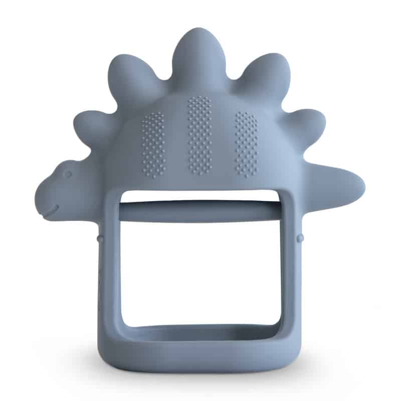 Mushie No-Drop Dino Teether in Tradewinds blue, featuring textured surfaces and a dinosaur shape for easy gripping.
