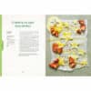 Allergy Sense book open to a recipe page featuring strawberry and maple syrup pancakes, with colorful fruit decorations.