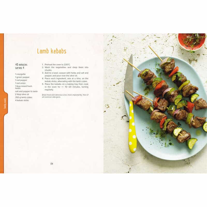 Lamb kebabs recipe page from Allergy Sense book, featuring colorful skewers of meat and vegetables on a yellow plate.