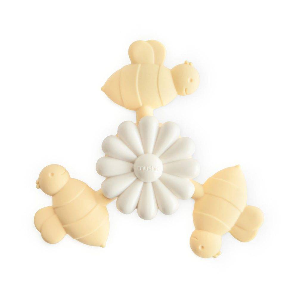Mushie Suction Spinner Toy in Bees, featuring a flower design with playful bee characters. Ideal for sensory play.