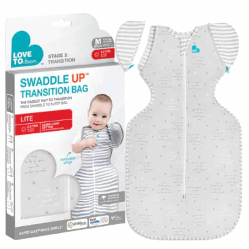 Love To Dream Swaddle Up Transition Bag Medium in Dusty Pink with grey and pink circles, designed for easy transition to
