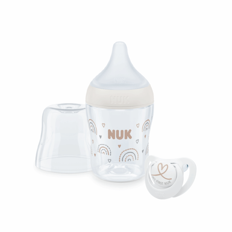 NUK Perfect Match Trial Pack featuring a clear bottle with rainbow design and a matching star soother.