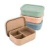 Maccie Munchmate Bento Lunchbox in baby blue, beige, green, and pink speckles with three compartments.