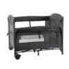 Baby Womb World Camping Cot and Co-Sleeper in dark grey with mesh sides and wheels for easy mobility.