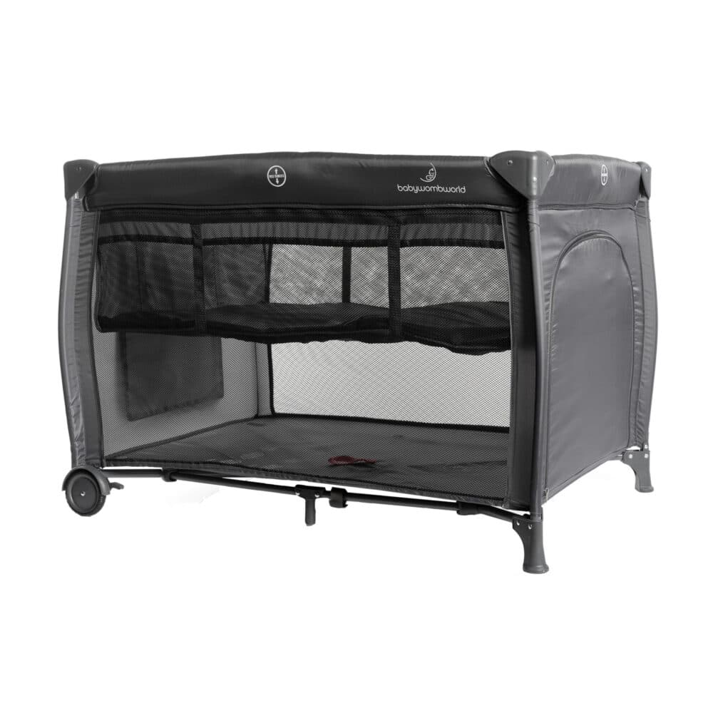 Baby Womb World Standard Camp Cot in grey with mesh sides and wheels for easy mobility. Ideal for nursery use.