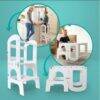 Baby Womb World 3-in-1 Convertible Stepstool, Desk Chair and Ladder in white, showing its versatile use in a kitchen and
