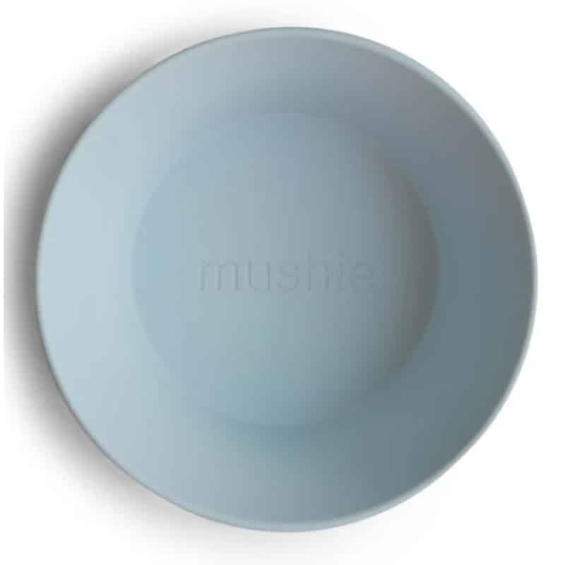 Mushie Dinner Bowl Round in Cloud, features a smooth, rounded design and subtle branding at the center.