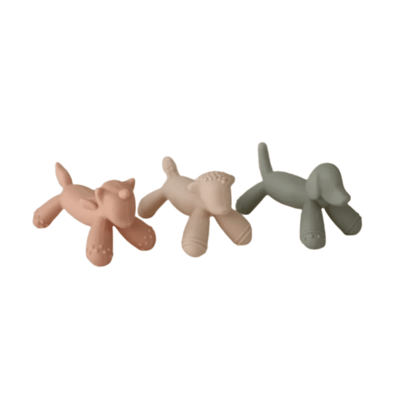 Mushie Figurine Teether set in dog, lamb, and unicorn shapes, featuring soft pastel colors and playful designs.