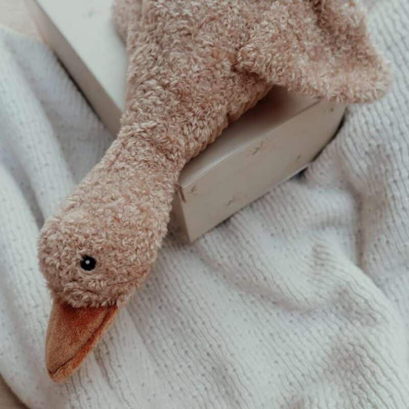 Flow Amsterdam Liva Heartbeat Rechargeable Comforter in beige and brown, featuring a soft, plush duck design.