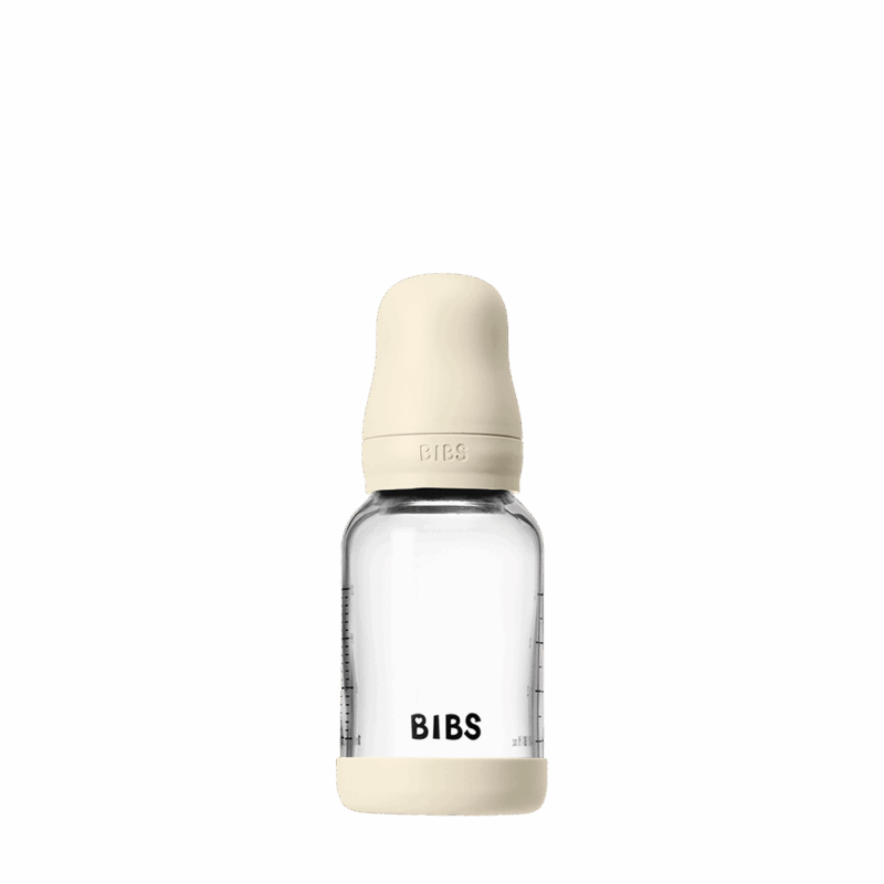 BIBS Glass Baby Bottle Round in Ivory, 120 ml, features a slow flow silicone nipple.