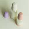 BIBS Glass Boheme Baby Bottle in Blush, Ivory, and Violet Sky with textured slow flow nipples on a light background.