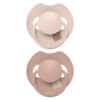 Difrax Dynamic Soother Prime 0-6M in nude and blush colors, featuring a round soft silicone nipple and ergonomic design.