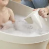 Eco Collection – Close up of Washy jug in use with toddler bath – high res – square