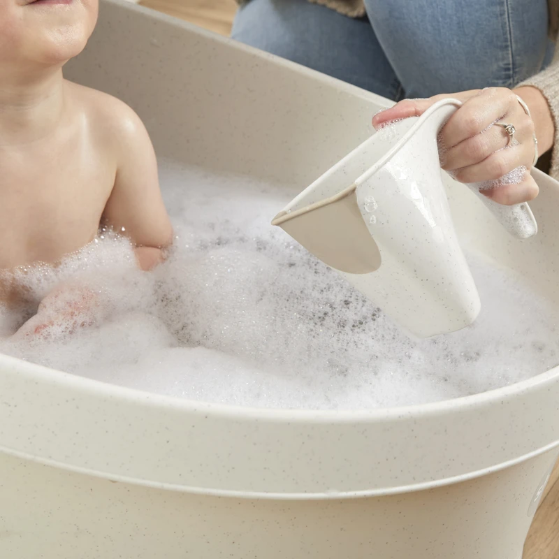 Eco Collection – Close up of Washy jug in use with toddler bath – high res – square