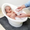 Newborn baby in Bath with Wishy – Low Res