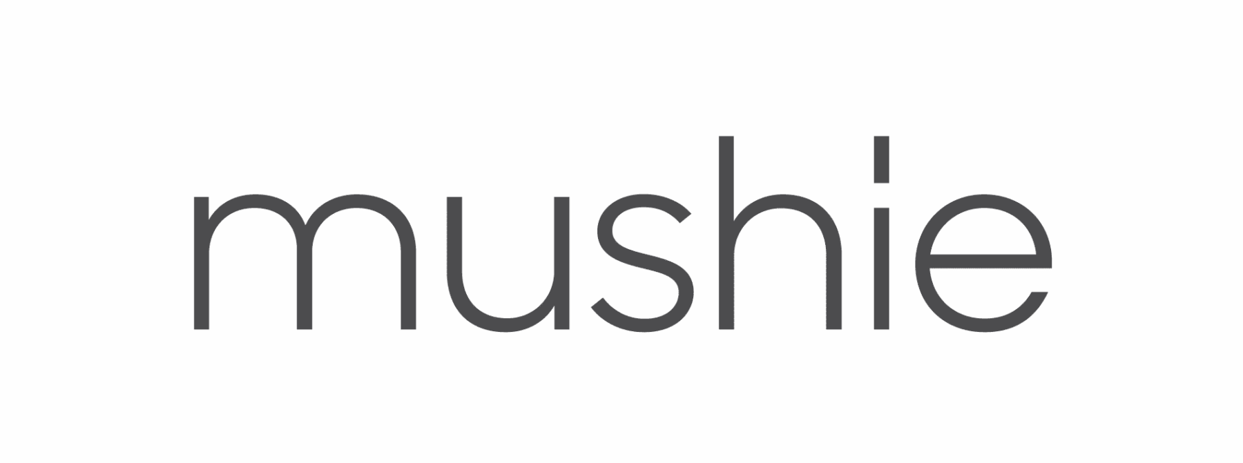 Mushie logo in a modern, minimalist font on a dark background.