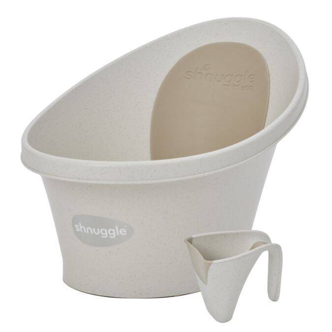 Shnuggle Eco Baby Bath Bundle in soft beige, featuring a bath and a small pouring cup. Eco-friendly design.